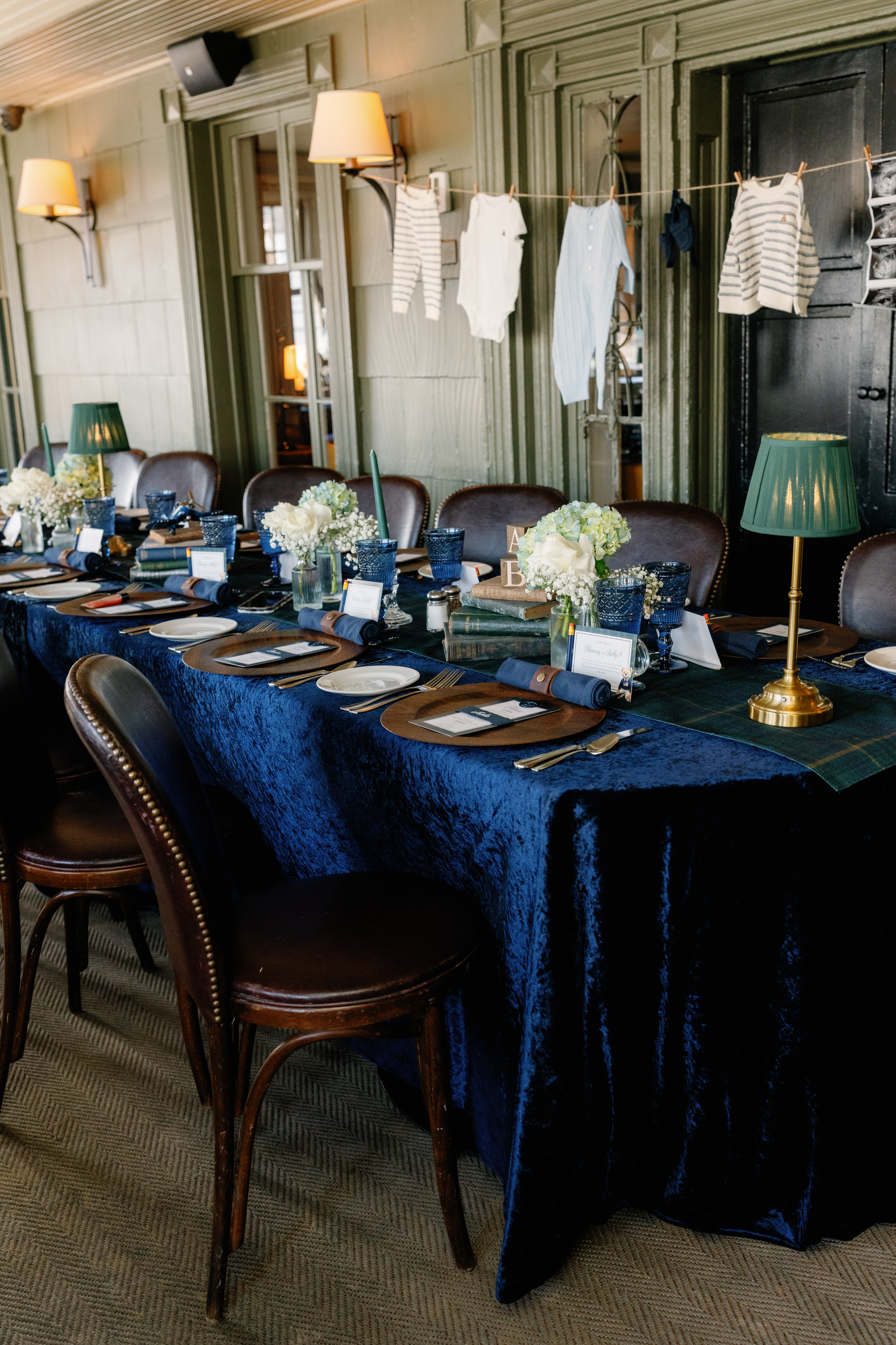 Fully styled baby shower venue with coordinated decor and table settings